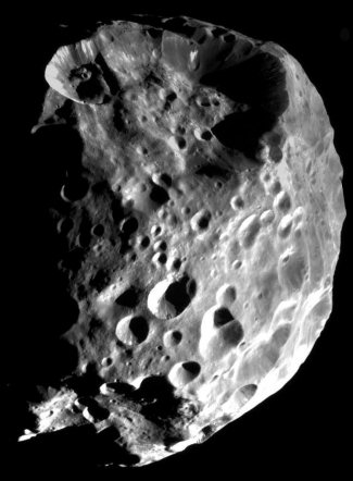 Scientists Discover Pluto Kin Is a Member of Saturn Family