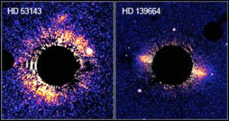 Dusty Planetary Disks Around Two Nearby Stars Resemble Our Kuiper Belt