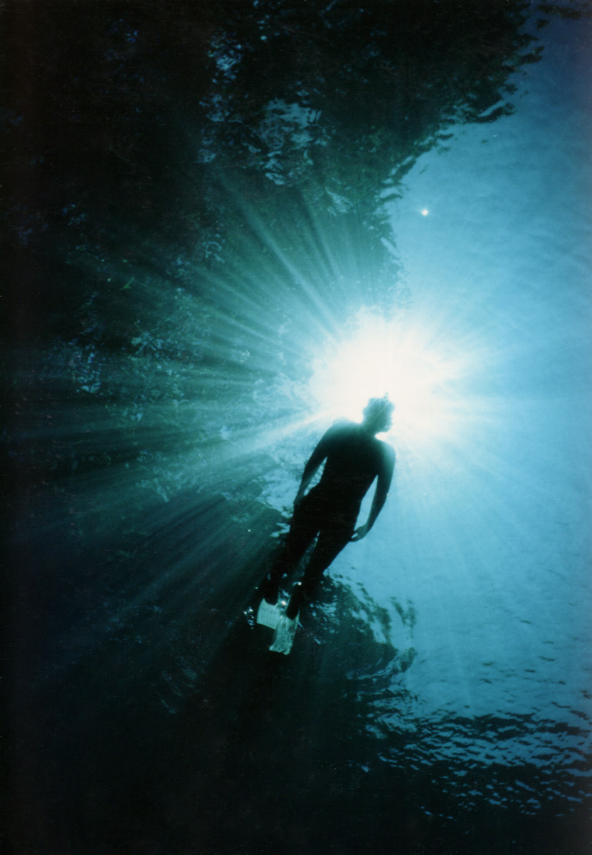 Diver Silhouette in Vanuatu Freshwater Spring