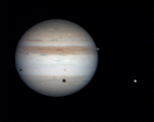 Jupiter with 3 moons and two shadows