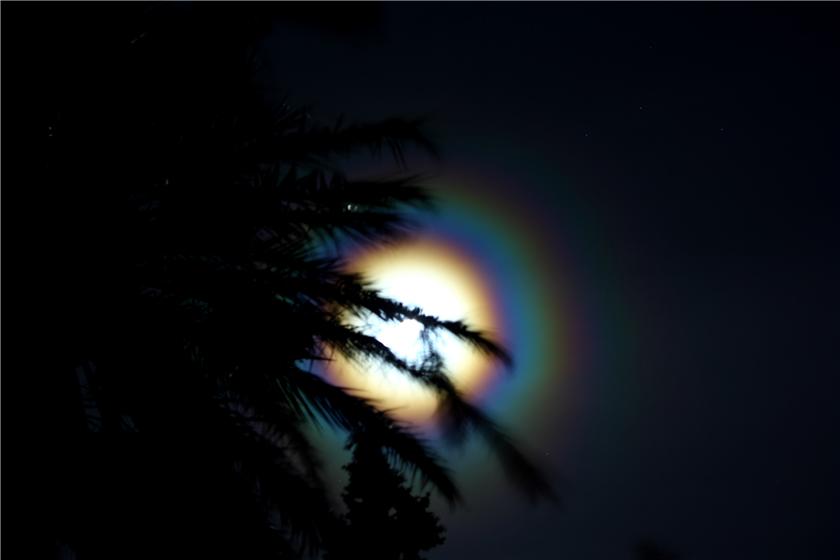 A rainbow around the Moon
